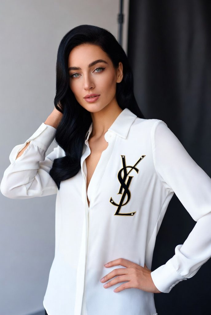 Elegant model wearing an authentic Yves Saint Laurent Silk Blouse crafted from premium mulberry silk with signature YSL monogram hardware, relaxed fit, and timeless Parisian luxury styling.