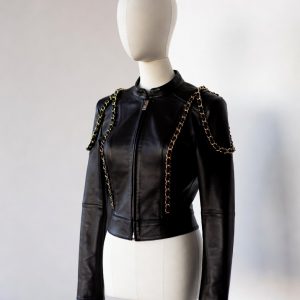 Authentic Chanel Black Lambskin Leather Jacket with Signature Gold Chain Accents