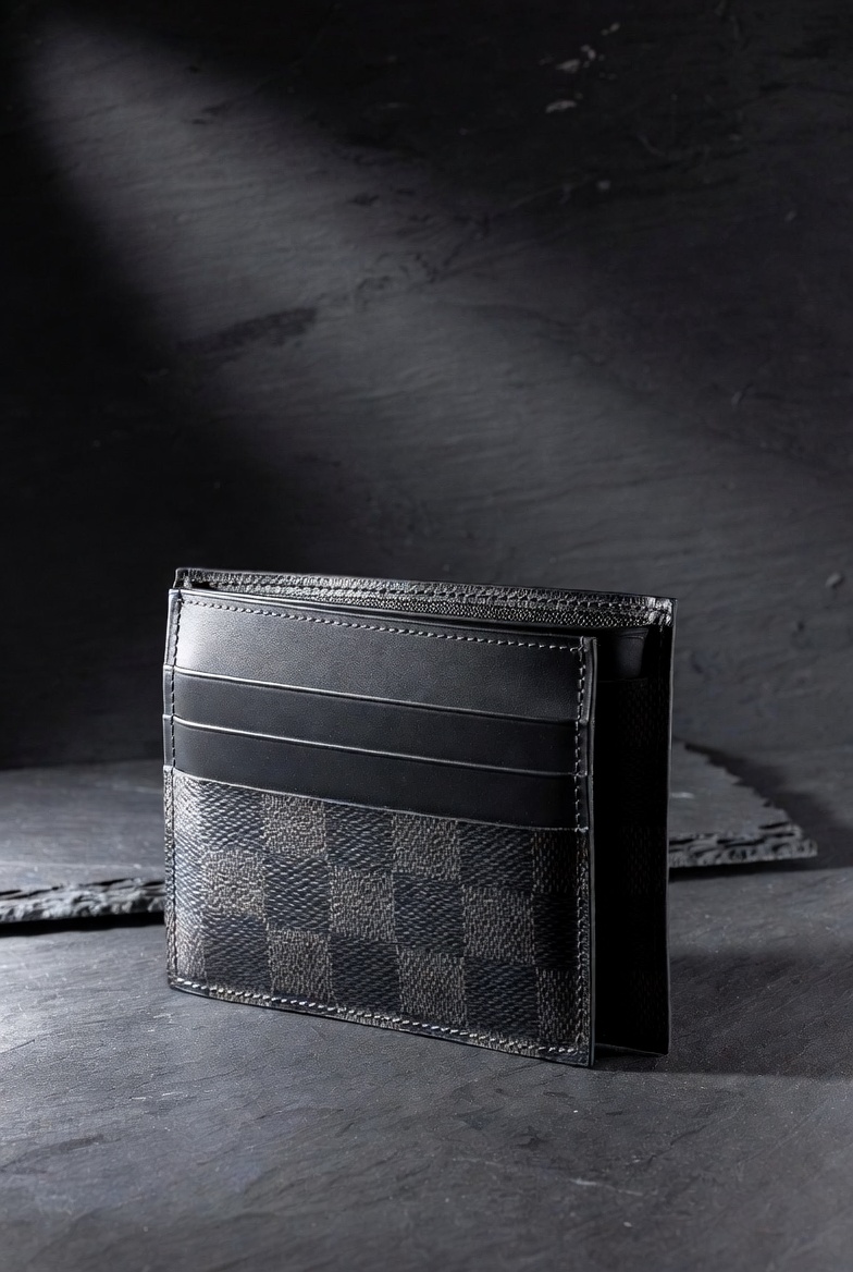 Louis Vuitton Damier Graphite bifold wallet with iconic checkerboard pattern and slim luxury design