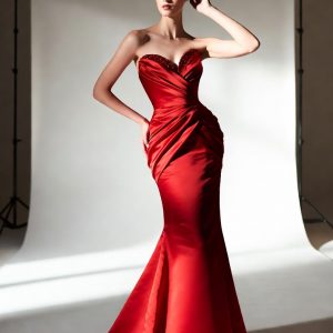 Dior red silk evening gown with crystal embellished bodice and mermaid silhouette